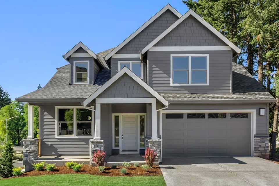 a modern, grey two story home